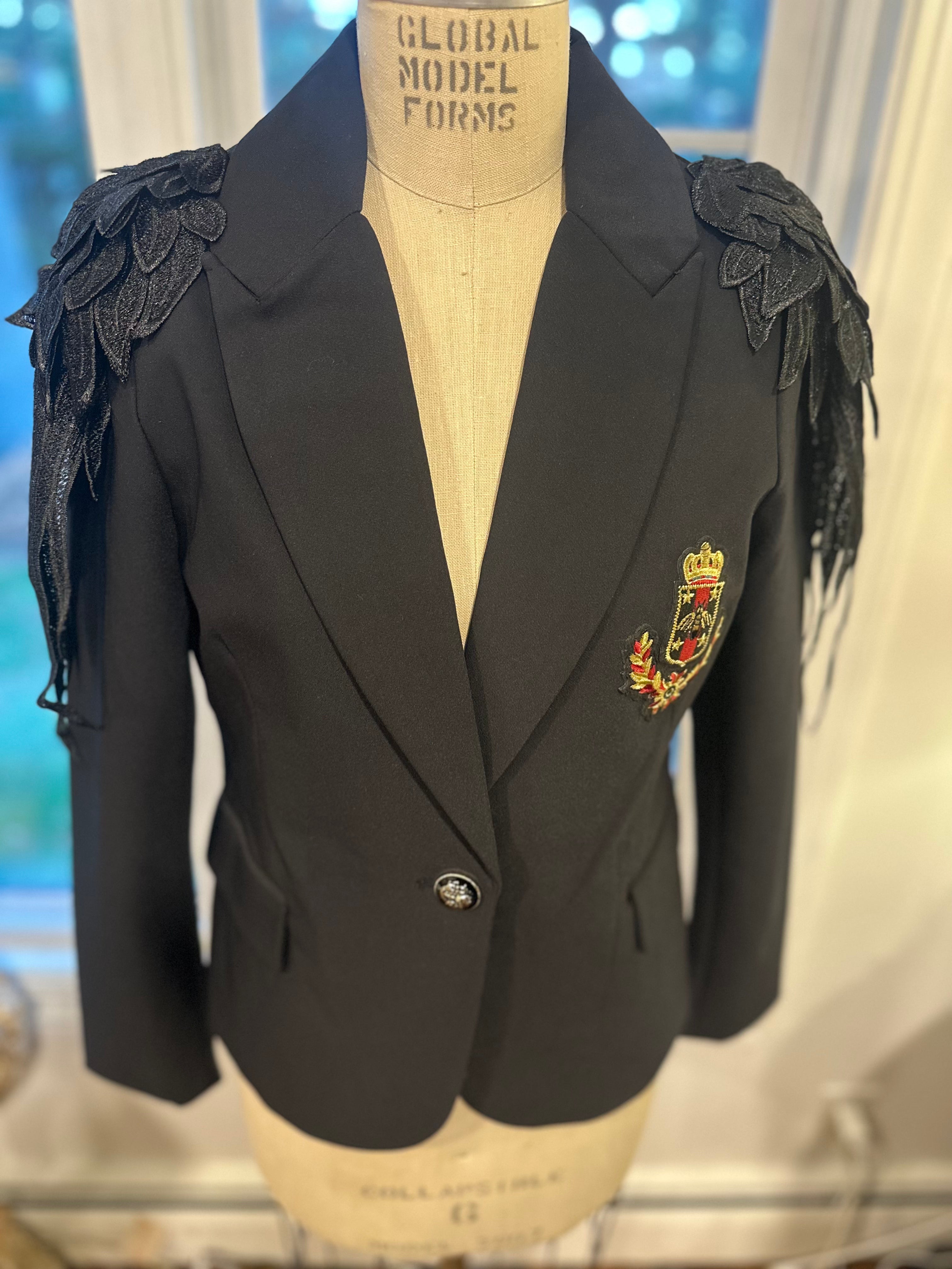 Elegant. Dark. Unforgettable.NICOLE MILLER Black Statement Blazer.