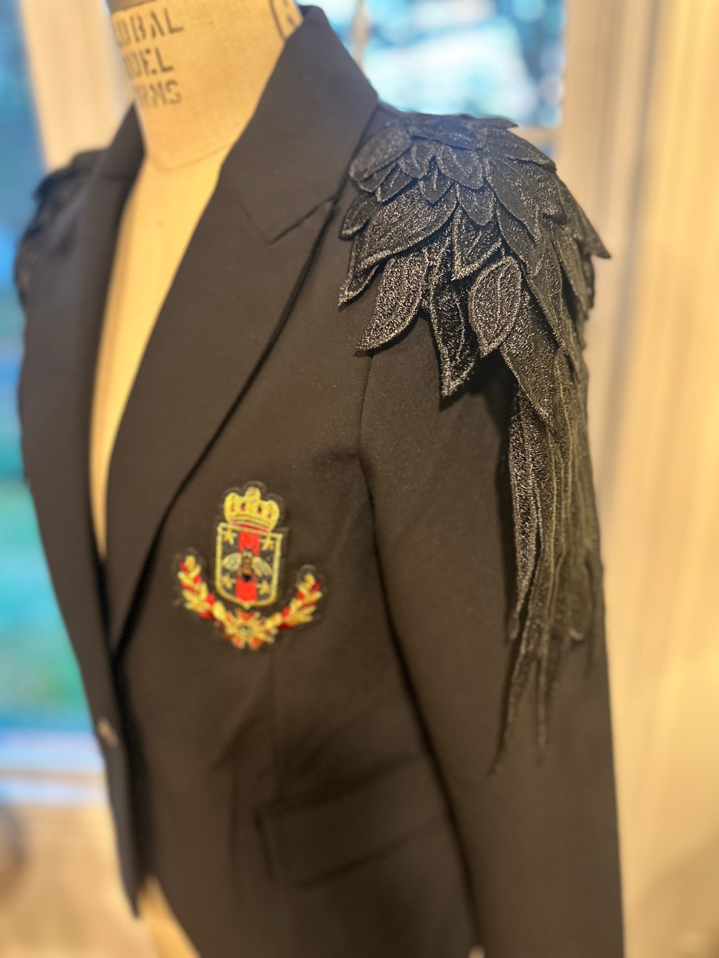 Elegant. Dark. Unforgettable.NICOLE MILLER Black Statement Blazer.