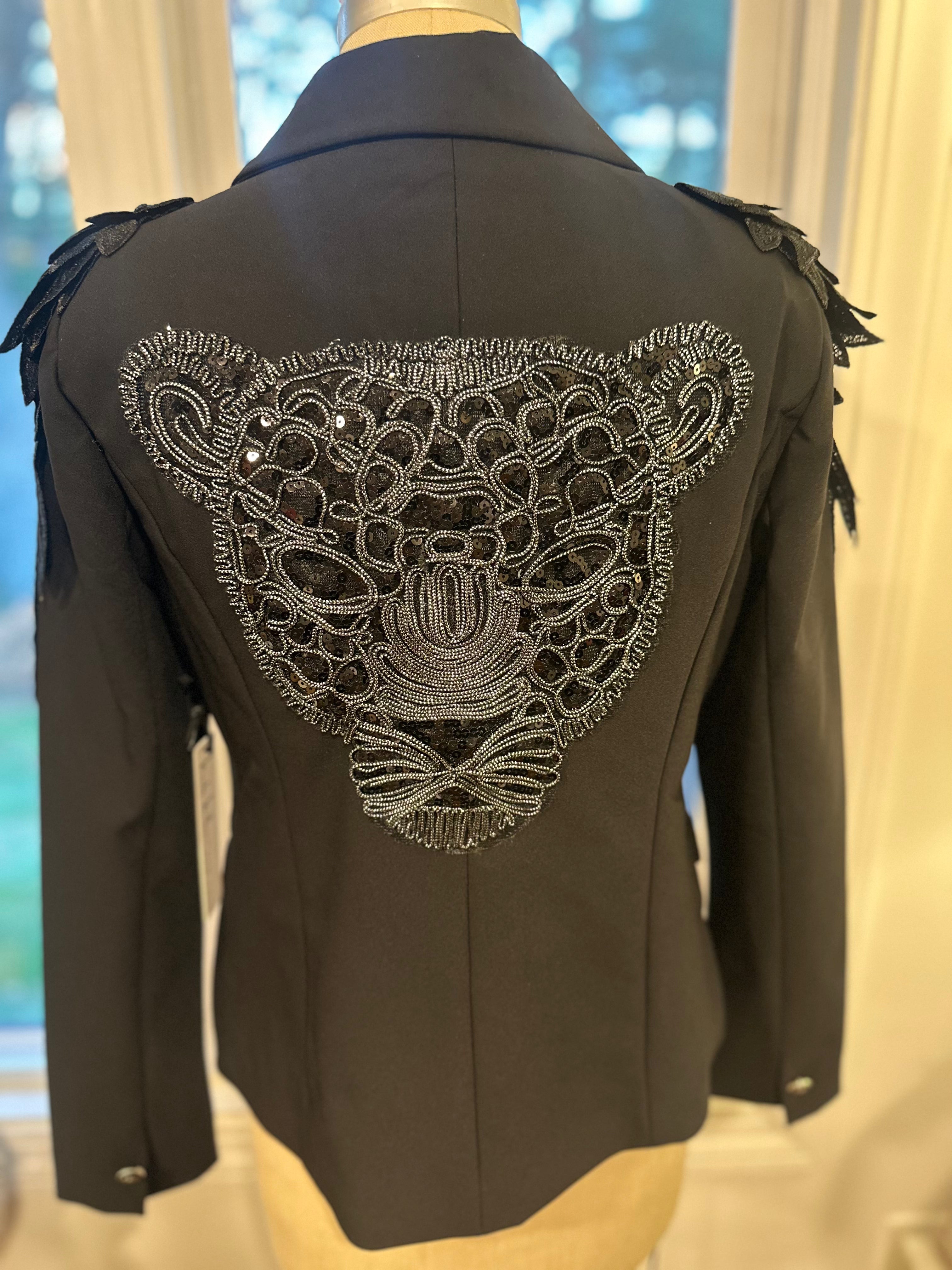 Elegant. Dark. Unforgettable.NICOLE MILLER Black Statement Blazer.